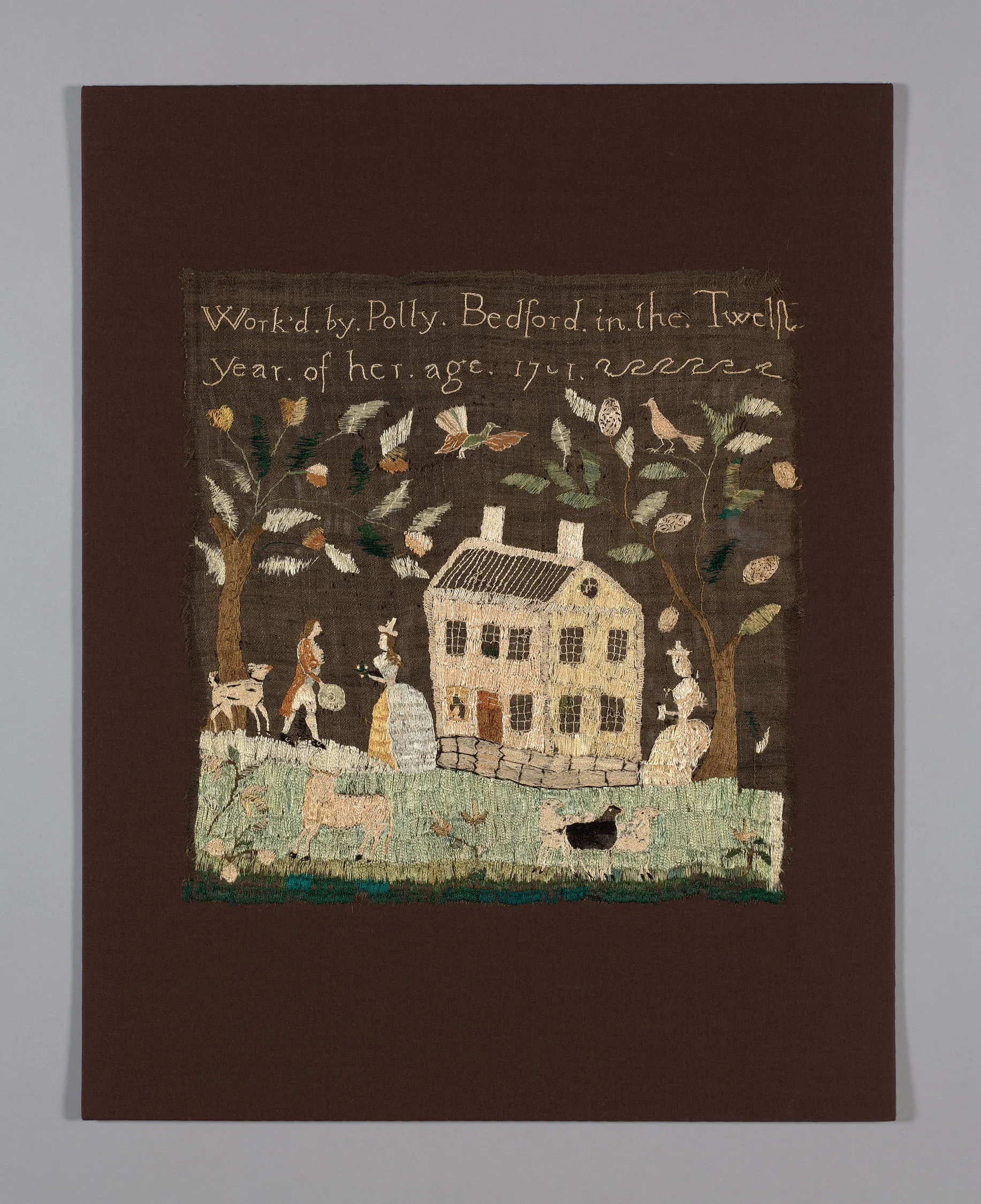 An embroidered sampler of a house between trees, with figures, birds and a dog, signed "Work'd by Polly Bedford in the Twelfth year of her age 1791"